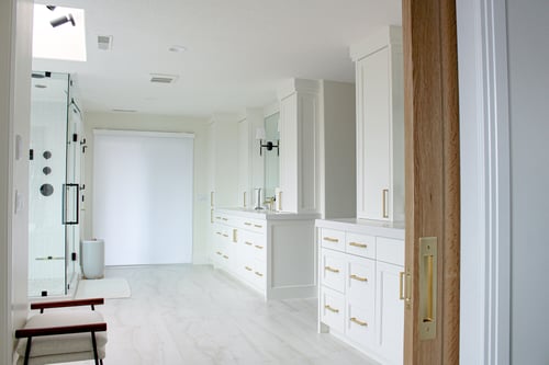 Spa-like master bathroom with walk-in shower and custom vanities by Conner Construction Company in Heber, UT