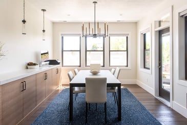 Stylish dining area remodel with chandelier in a Conner Construction home in Provo, Utah