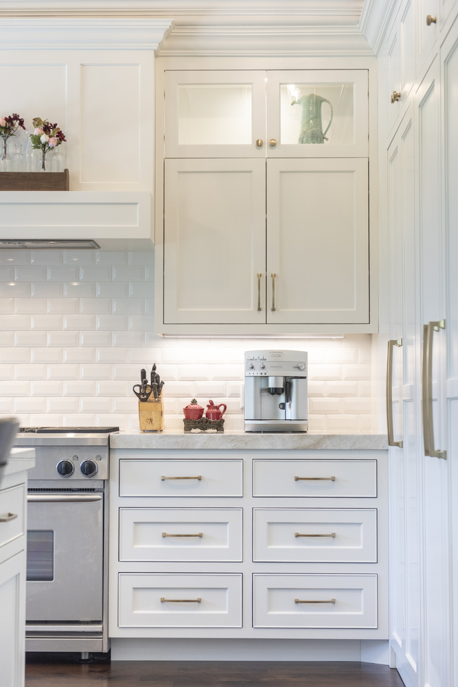 Custom kitchen coffee station with white tile backsplash and built-in cabinetry by Conner Construction Company in Midway, UT
