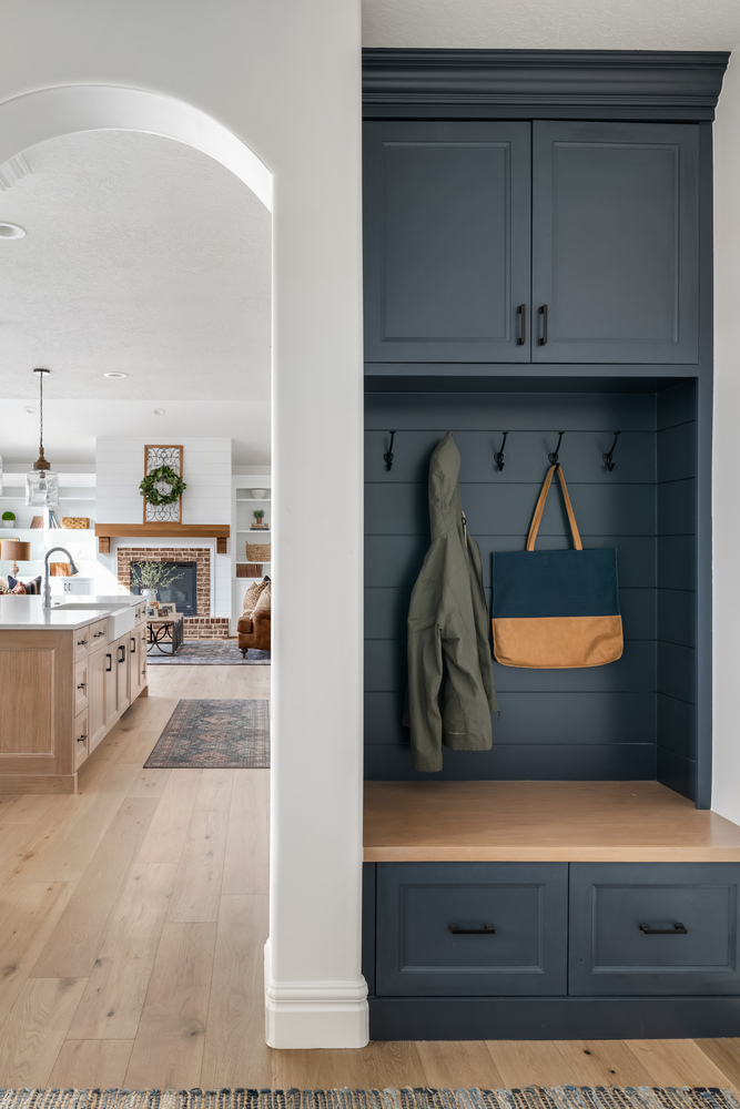 Conner Construction Company custom mudroom built-in next to kitchen in Highland, UT