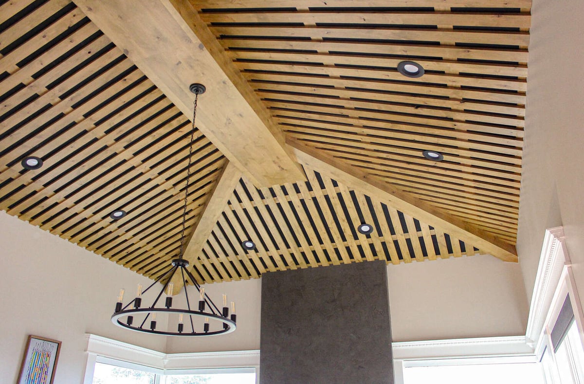 Unique wood beam ceiling with recessed lighting in a Heber, UT custom home by Conner Construction Company