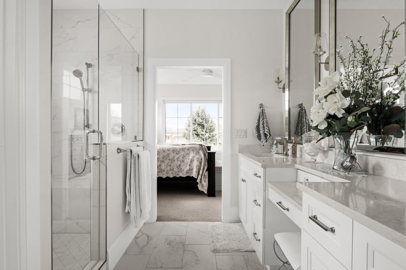 Luxury bathroom with glass shower and white vanity in Conner Construction custom home in Pleasant Grove, UT