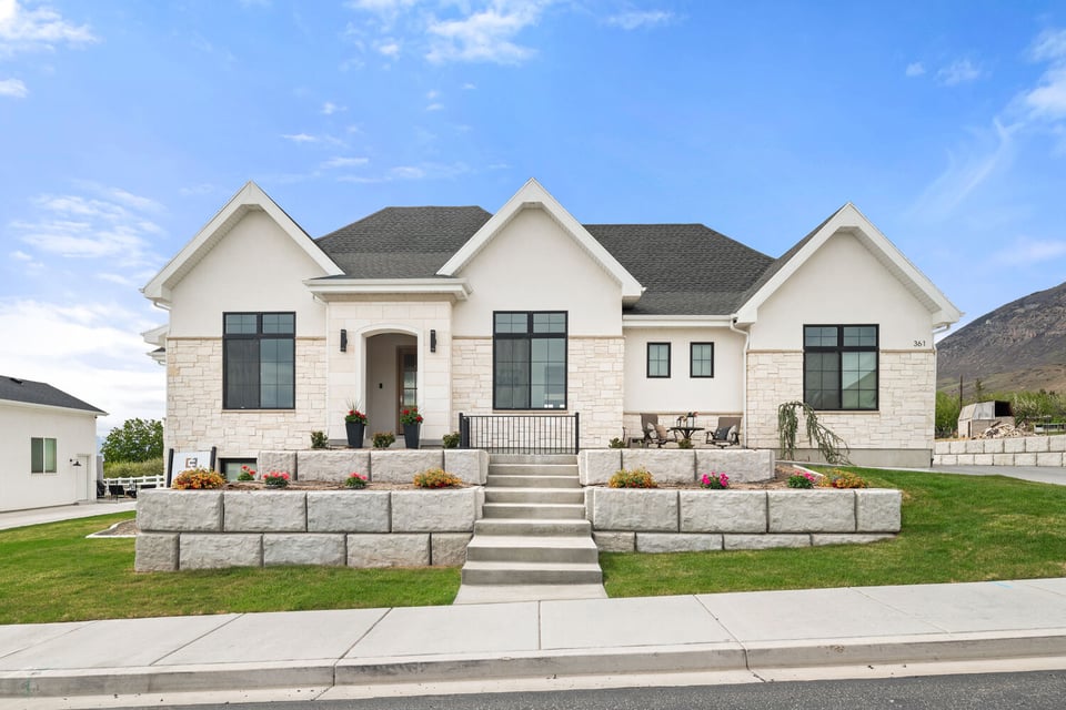 Modern custom home exterior with stone accents by Conner Construction Company in Pleasant Grove, Utah