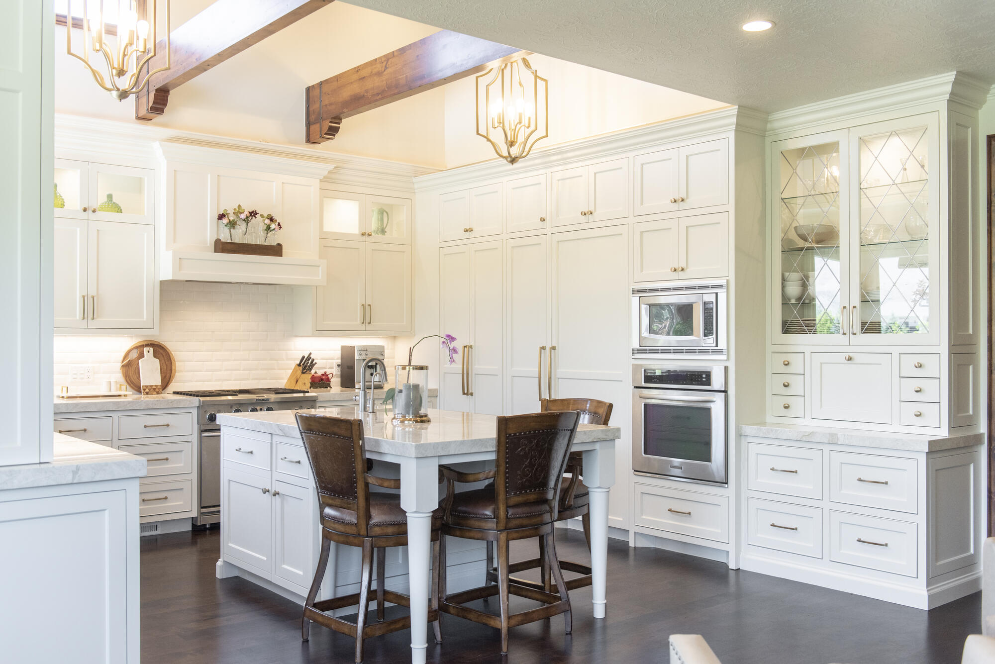Elegant white custom kitchen with island by Conner Construction Company in Cedar Hills, Utah