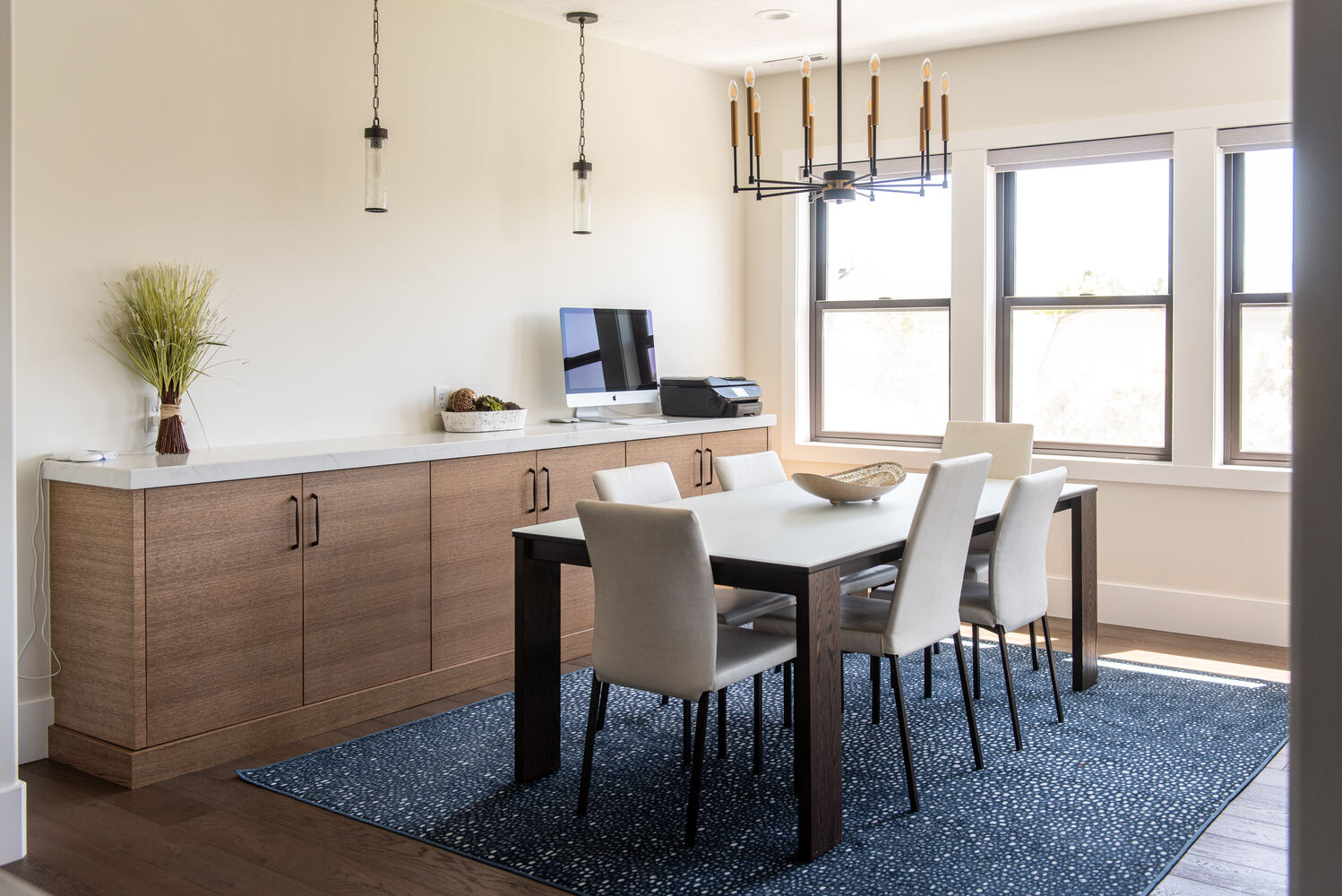 Elegant dining room with chandelier in a Conner Construction custom home in Pleasant Grove, Utah
