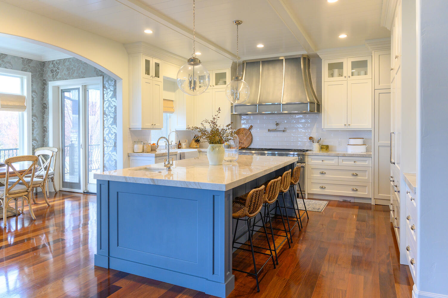 Elegant custom kitchen with blue island by Conner Construction in Eagle Mountain, Utah