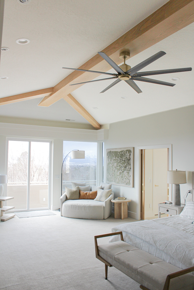 Bright master bedroom with vaulted ceilings and large windows in a custom home by Conner Construction Company in Sundance, UT