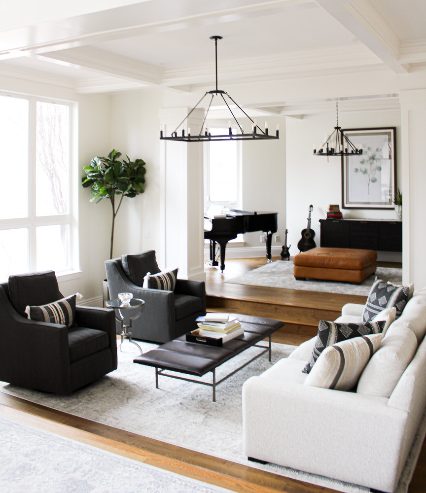 Transitional living room with open layout and grand piano in a custom home by Conner Construction Company in Alpine, UT
